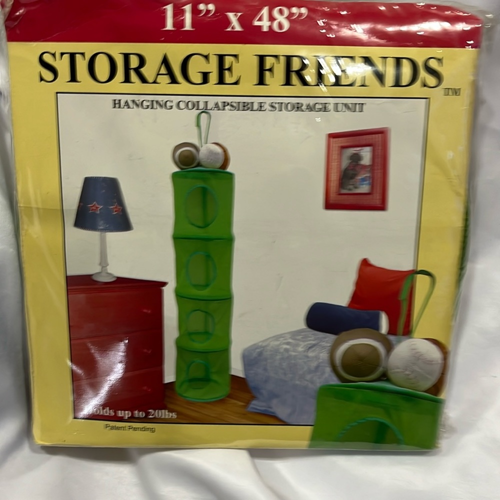 Hanging storage unit for toys and or clothing…
